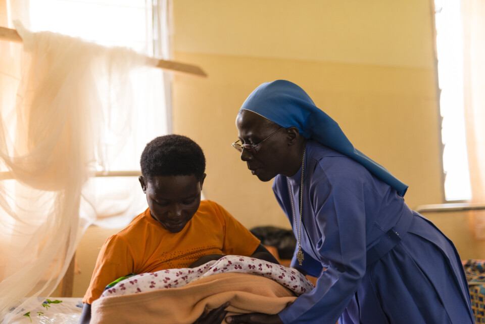 Image 4 Sister Mary Checks Up On A Newborn At St Luke Health Centre