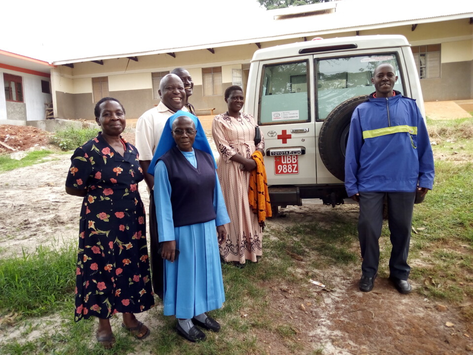 Sister Mary And Parish Community Members With New Ambulance Bujuni